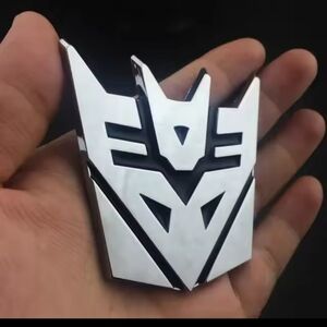 New silver Transformers Autobot Car Badge With Adhesive Back